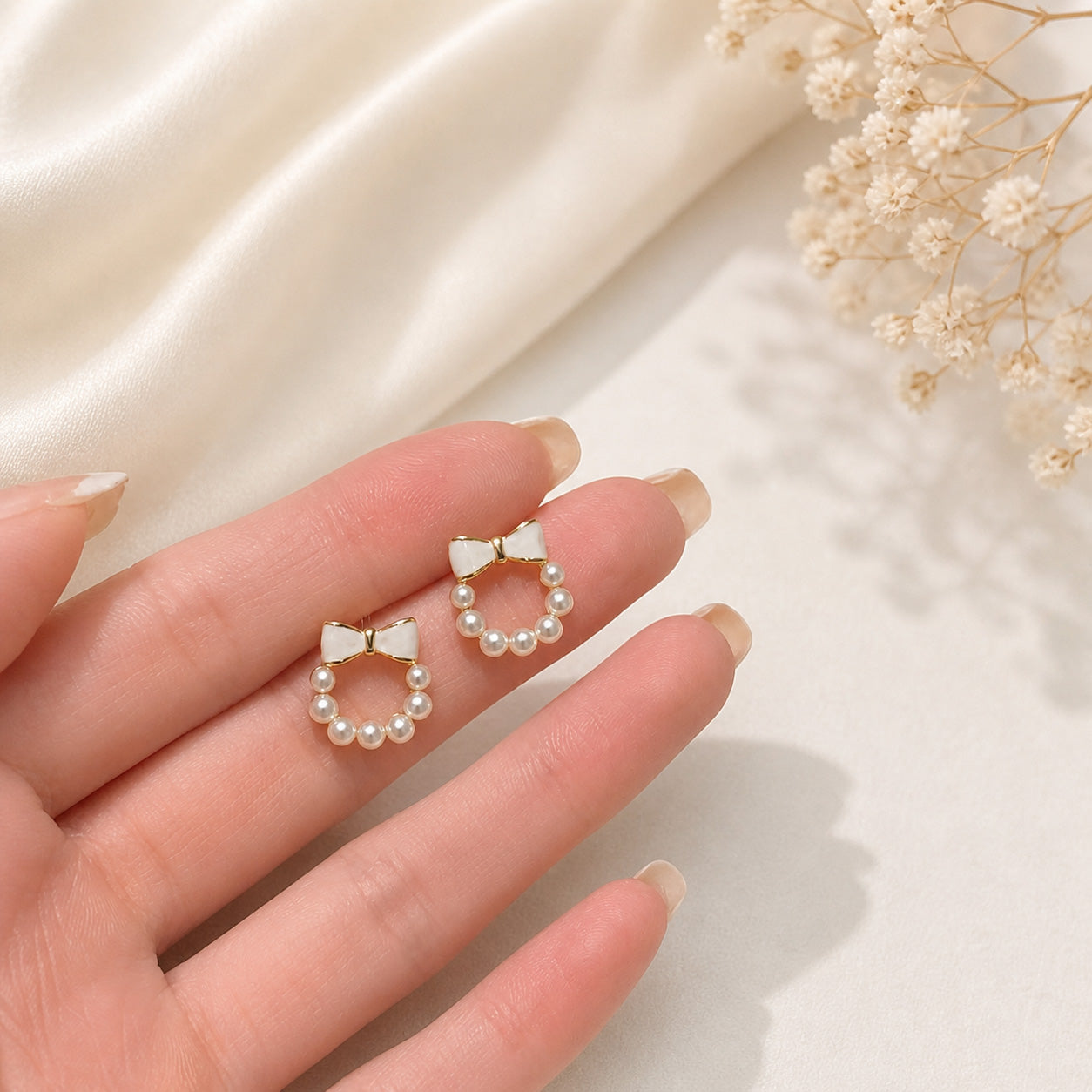 Pearl Ribbon Stud Earrings