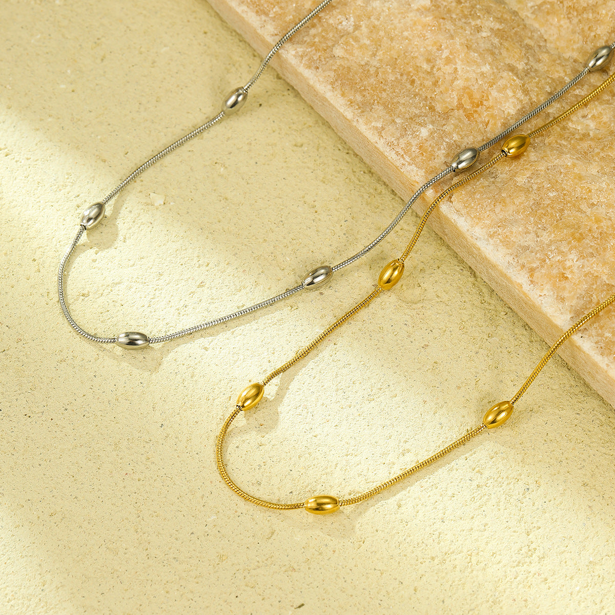 Gold Oval Bead Station Necklace