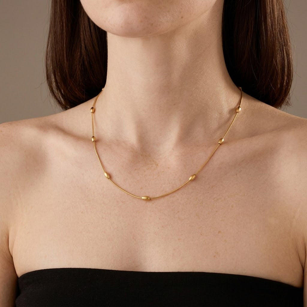Gold Oval Bead Station Necklace